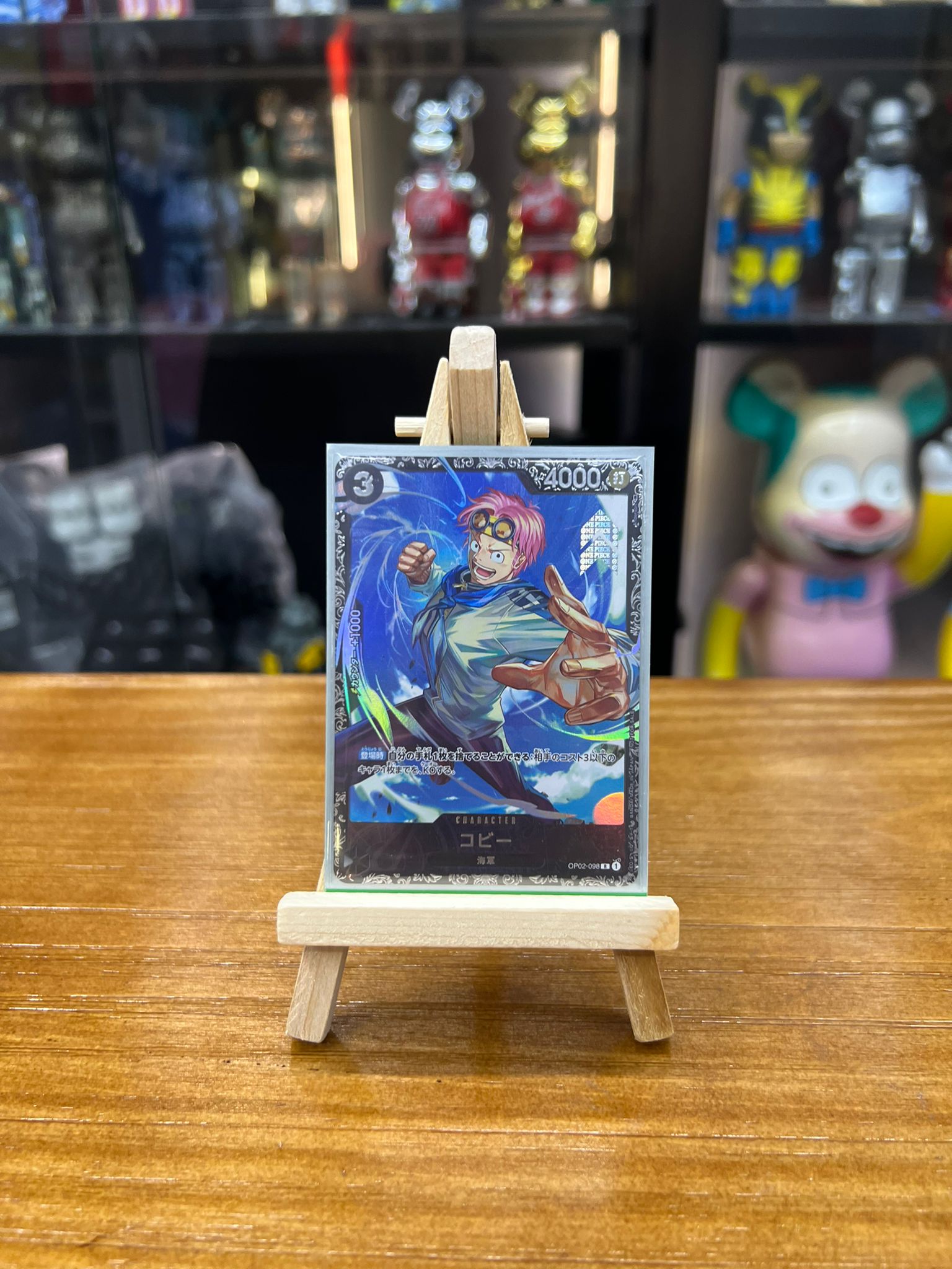 One Piece Card (OP02-098) R コビー(パラレル)(フラッグシップバトル) – Madmaxtoys