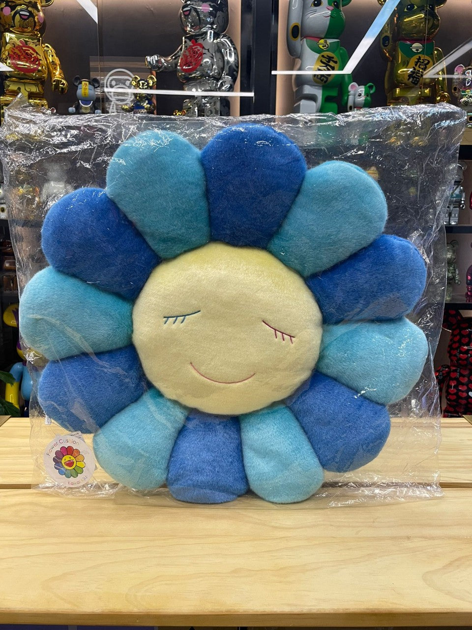 Coussin fleuri 60 cm (bleu et bleu clair)
